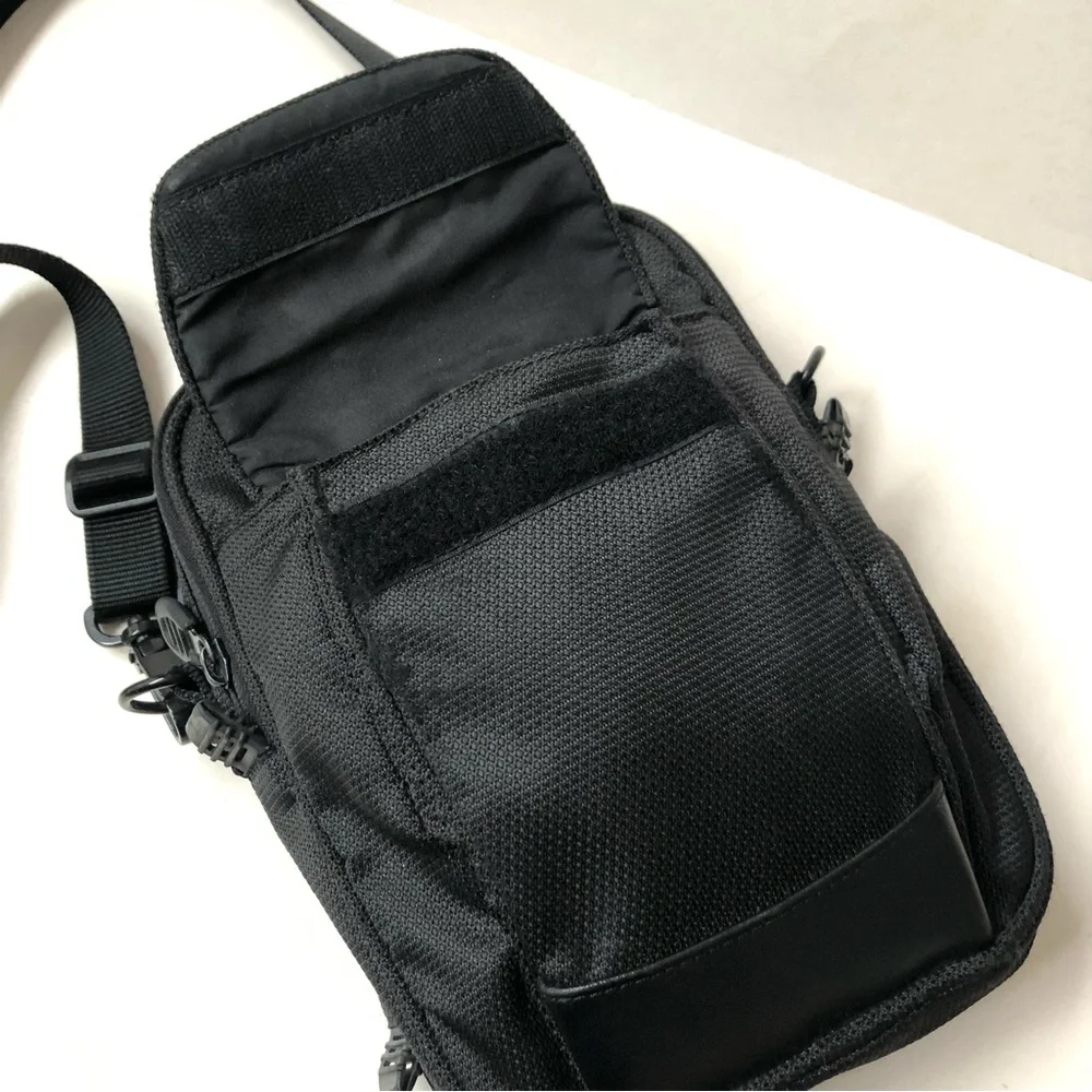 TUMI Leather & Canvas Unisex Shoulder Bag, Gently Used.